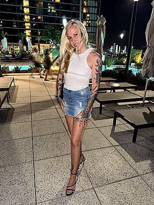 Denim mini and heels out and about'