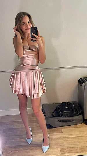 Do I look so classy in this pink dress?'