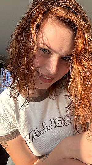 What kind of dress would go best with my hair to give me a classy look? I need some style advice!'