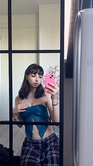 college girl getting dolled up'