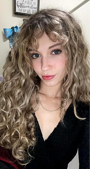 freckles and curls :)'