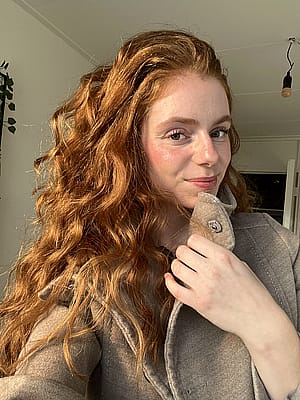 Confidence wrapped in fiery hair'