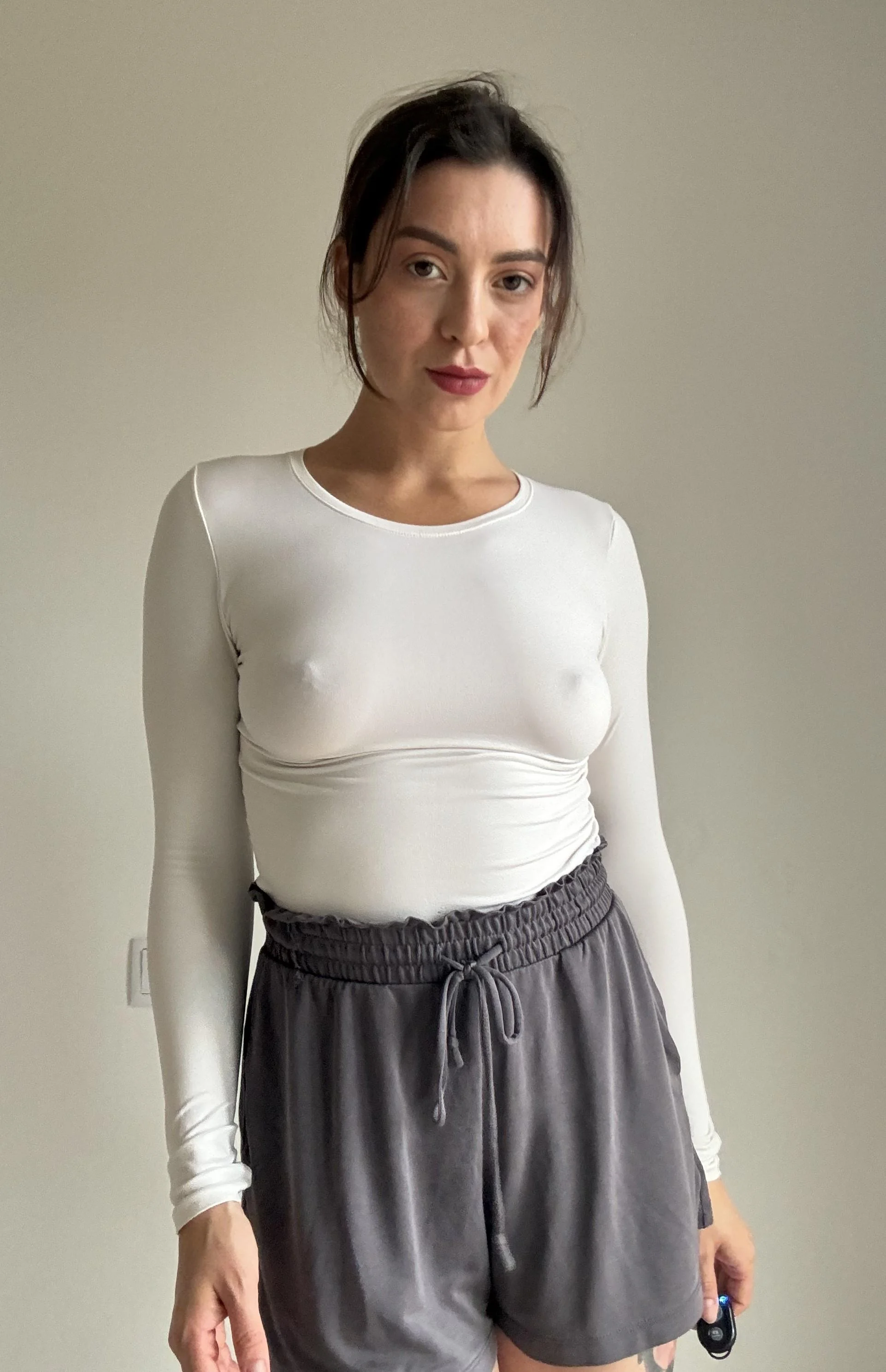 Braless in a white tight outfit is the best picture 1 of 1