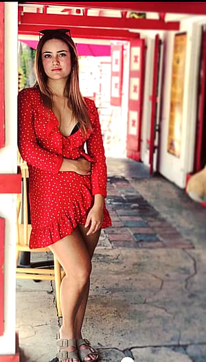 How do I look in red dress?'