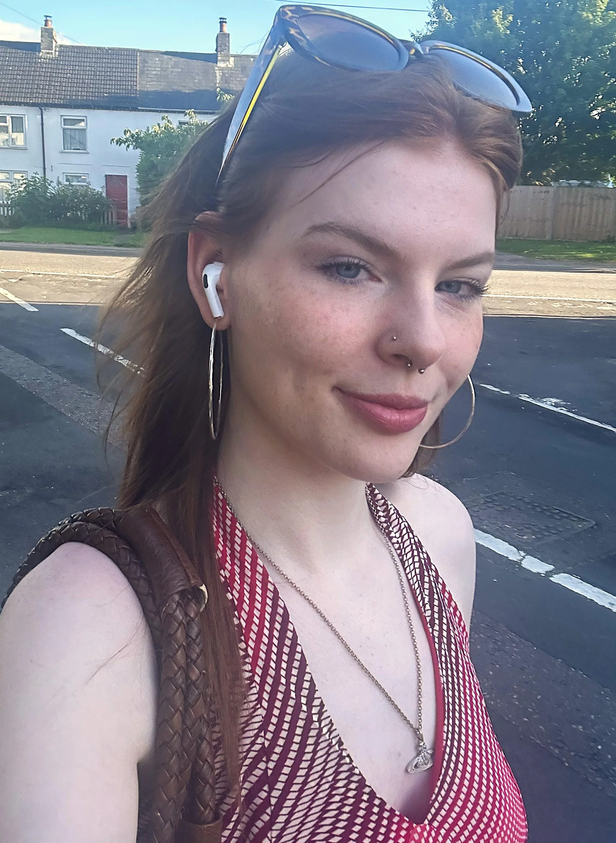 A classy red head wearing red dress picture 1 of 1