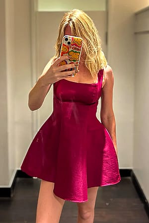 Does this dress make me irresistible, or is it just me? 💃🔥'