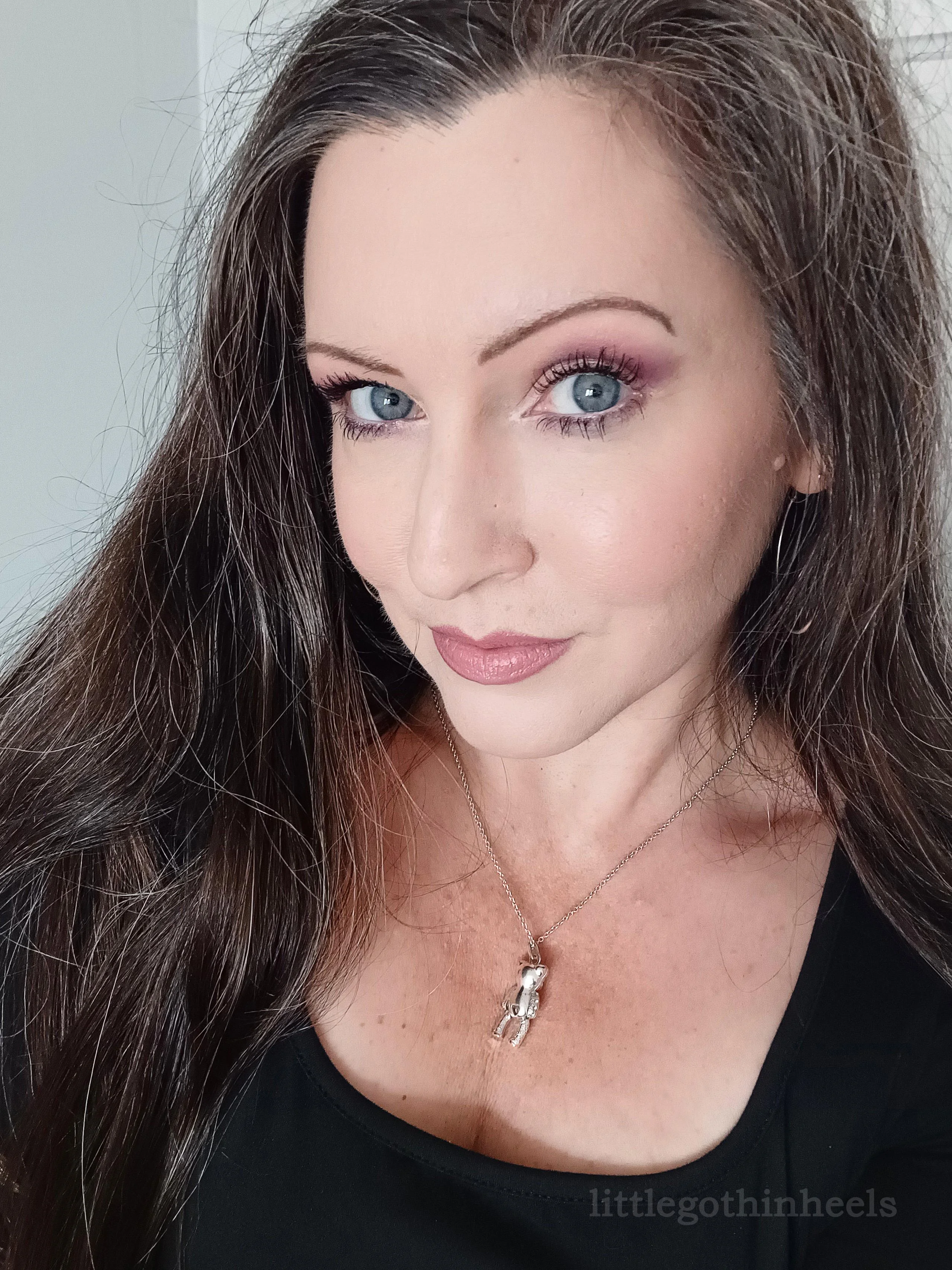 black top and simple makeup picture 1 of 1