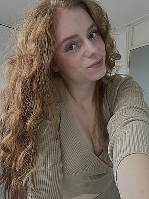 A stunning muse in pale and fire.'