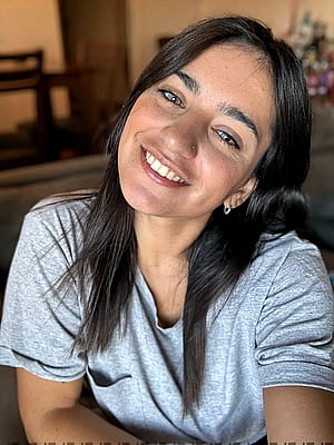 Soft smile, strong core—finding balance in every moment.'