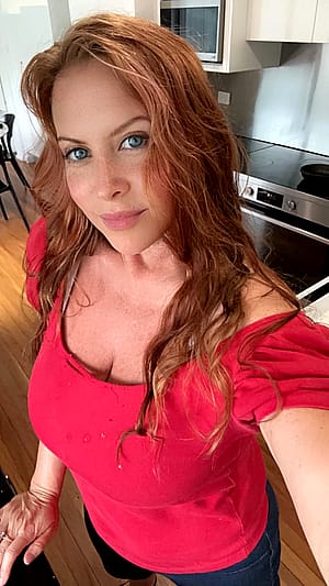 Just a redhead with freckles and a smile.'