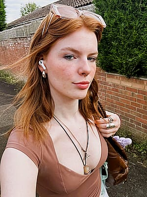 sexy red hair girl in brown top'