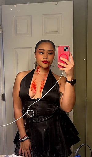 All dolled up after I sucked a victim'